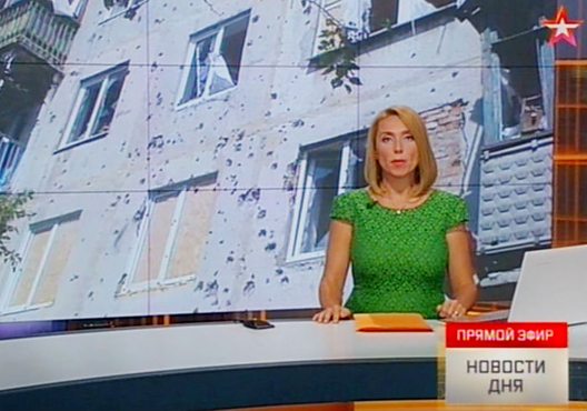 Zvezda TV channel is silent on Russian deployments near Ukraine but is keen to report on what it says is the destruction wrought on the rebel heartlands of Donetsk and Luhansk by Ukrainian forces